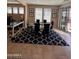 Bright dining room with a table, chairs, and large windows at 29316 N Lone Pine Ln, Rio Verde, AZ 85263