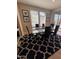 Elegant dining area with a geometric patterned rug at 29316 N Lone Pine Ln, Rio Verde, AZ 85263