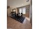Dining area with glass table, chairs, and patterned rug at 29316 N Lone Pine Ln, Rio Verde, AZ 85263
