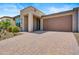 Single-story home with two-car garage and landscaped front yard at 29316 N Lone Pine Ln, Rio Verde, AZ 85263