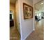 Bright hallway with tile flooring, leading to bathroom and living areas at 29316 N Lone Pine Ln, Rio Verde, AZ 85263