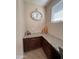 Built-in home office with granite countertop and cabinets at 29316 N Lone Pine Ln, Rio Verde, AZ 85263