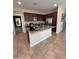 Island kitchen with granite countertops and stainless steel appliances at 29316 N Lone Pine Ln, Rio Verde, AZ 85263