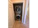 Stackable washer and dryer in a small laundry room at 29316 N Lone Pine Ln, Rio Verde, AZ 85263