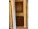 Neat storage closet with wooden cabinets and shelves at 29316 N Lone Pine Ln, Rio Verde, AZ 85263