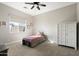 Simple bedroom with a single bed and ample closet space at 338 W Fairfield St, San Tan Valley, AZ 85143