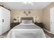 Spacious bedroom with a cozy bed and built-in shelving at 4301 N 21St St # 24, Phoenix, AZ 85016