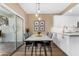 Kitchen dining area with table and chairs, access to a patio at 4301 N 21St St # 24, Phoenix, AZ 85016