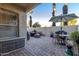Private patio with seating area, fire pit, and grill at 4301 N 21St St # 24, Phoenix, AZ 85016