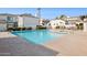 Inviting community pool with lounge chairs and surrounding landscaping at 4301 N 21St St # 24, Phoenix, AZ 85016