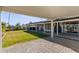 Large backyard with grassy area and covered patio at 4356 E Coconino St, Phoenix, AZ 85044