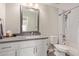 Updated bathroom with a modern vanity and shower/tub combo at 4356 E Coconino St, Phoenix, AZ 85044