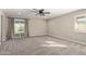 Bright bedroom with carpet flooring and sliding door to backyard at 4356 E Coconino St, Phoenix, AZ 85044