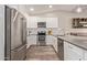 Updated kitchen featuring stainless steel appliances and white shaker cabinets at 4356 E Coconino St, Phoenix, AZ 85044