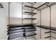 Well-organized closet with ample shelving and drawers at 4809 E Monte Cristo Ave, Scottsdale, AZ 85254