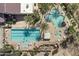 Aerial view of community pool, lounge area, recreation area, and lap pool surrounded by mature trees at 5028 S Peachwood Dr, Gilbert, AZ 85298