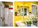 Bathroom with yellow walls, single sink vanity, and shower/tub combo at 5028 S Peachwood Dr, Gilbert, AZ 85298