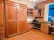 Home office featuring custom built in murphy bed, desk and storage to maximize functionality at 5028 S Peachwood Dr, Gilbert, AZ 85298