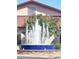 A beautiful water fountain adds a touch of elegance to the community's landscape at 5028 S Peachwood Dr, Gilbert, AZ 85298