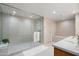 Modern bathroom featuring a large walk-in shower and double vanity at 5455 E Lincoln Dr # 3002, Paradise Valley, AZ 85253