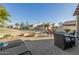 Spacious backyard with fire pit and seating area, great for gatherings at 6202 E Mckellips Rd # 91, Mesa, AZ 85215