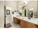 Double vanity bathroom with ample counter space and a large mirror at 6202 E Mckellips Rd # 91, Mesa, AZ 85215