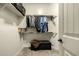 Walk-in closet with built-in shelving and hanging rods at 6202 E Mckellips Rd # 91, Mesa, AZ 85215