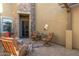 Cozy courtyard with seating area and a wrought iron gate at 6202 E Mckellips Rd # 91, Mesa, AZ 85215