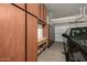 Garage with built-in cabinets and overhead storage at 6202 E Mckellips Rd # 91, Mesa, AZ 85215