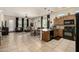 Modern kitchen with granite countertops and black appliances at 6202 E Mckellips Rd # 91, Mesa, AZ 85215