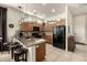 Modern kitchen with granite countertops and black appliances at 6202 E Mckellips Rd # 91, Mesa, AZ 85215