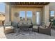 Relaxing covered patio with seating area, perfect for outdoor entertaining at 6202 E Mckellips Rd # 91, Mesa, AZ 85215