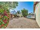 Spacious backyard with gravel and plants at 7357 W Canterbury Dr, Peoria, AZ 85345