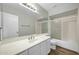 Bathroom with tub, sink, and vanity at 7357 W Canterbury Dr, Peoria, AZ 85345