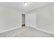 Bright bedroom with carpet and double door closet at 7357 W Canterbury Dr, Peoria, AZ 85345
