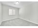 Bedroom with window and plantation shutters at 7357 W Canterbury Dr, Peoria, AZ 85345