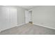 Bedroom with double door closet and carpet at 7357 W Canterbury Dr, Peoria, AZ 85345