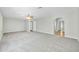 Primary bedroom with carpet flooring and access to bathroom at 7357 W Canterbury Dr, Peoria, AZ 85345
