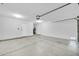 Spacious garage with white walls at 7357 W Canterbury Dr, Peoria, AZ 85345