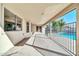 Covered patio overlooking a sparkling pool at 7357 W Canterbury Dr, Peoria, AZ 85345
