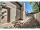 Brick pathway leads to backyard at 7357 W Canterbury Dr, Peoria, AZ 85345