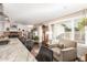 Modern kitchen with large island and built-in bookcases at 831 E Desert Park Ln, Phoenix, AZ 85020