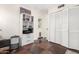 Bright laundry room featuring built-in shelving and cabinets at 831 E Desert Park Ln, Phoenix, AZ 85020