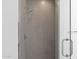 Modern shower with frameless glass enclosure and gray tile at 100 W Northern Ave # 7, Phoenix, AZ 85021