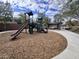 Community playground with play structures and a covered picnic area at 10154 W Lawrence Ln, Peoria, AZ 85345