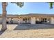 Covered patio and grassy backyard at 11360 E Keats Ave # 78, Mesa, AZ 85209