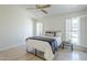 Bright bedroom with tile floors, ceiling fan, and windows offering natural light at 11360 E Keats Ave # 78, Mesa, AZ 85209