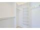 Walk-in closet with built-in shelving and clothing racks at 11360 E Keats Ave # 78, Mesa, AZ 85209