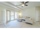 Cozy living room with ceiling fan and patio access for indoor/outdoor lifestyle at 11360 E Keats Ave # 78, Mesa, AZ 85209