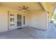 Enclosed patio area featuring a ceiling fan and secure entry door, extending indoor-outdoor living at 11360 E Keats Ave # 78, Mesa, AZ 85209